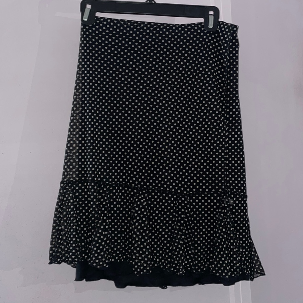 Polka dotted skirt with ruffle hem